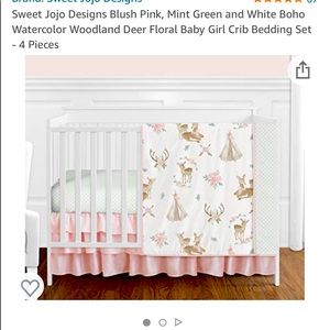 Crib bumber, sheets, comforter, throw pillows, skirt, and diaper holder included